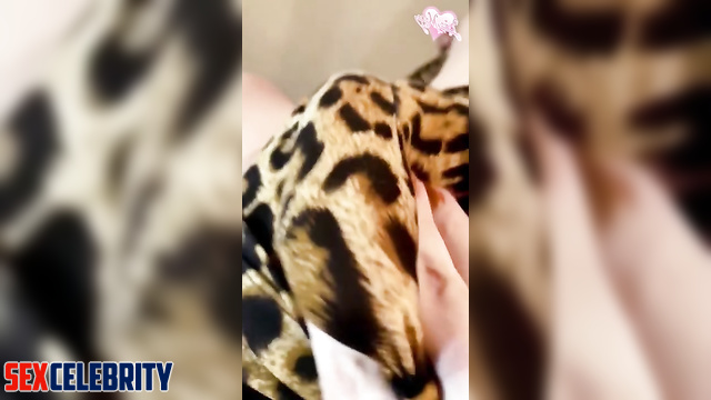 Horny Melissa Rauch plays tease with her dick in a leopard print dress